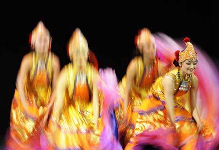 Artists from China&apos;s Central Ensemble of National Minorities Songs and Dances perform at the Egyptian National Theatre in Cairo, capital of Egypt, Feb. 2, 2009. The performance is part of the &apos;Egypt Chinese Art Week&apos;. (Xinhua/Zhang Ning)