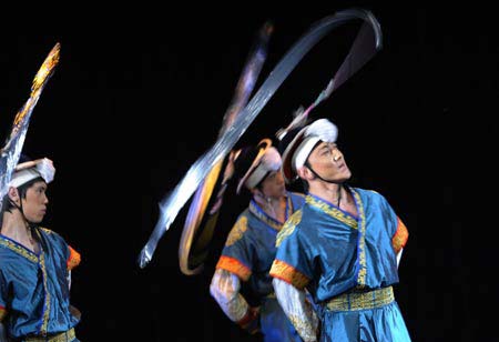 Artists from China's Central Ensemble of National Minorities Songs and Dances perform at the Egyptian National Theatre in Cairo, capital of Egypt, Feb. 2, 2009. The performance is part of the 'Egypt Chinese Art Week'. (Xinhua/Zhang Ning) 