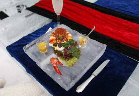 Dinner, served on an ice plate is pictured at the ice hotel during a photo opportunity in the Alpha Resort-Tomamu's ice village in Shimukappu town, Japan's northern island of Hokkaido Feb. 3, 2009. (Xinhua/Reuters Photo)