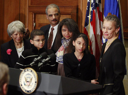 Eric Holder (2nd L) is pictured with his mother Miriam (L), his wife Sharon (R) and his children after being sworn as U.S. Attorney General at the Justice Department in Washington Feb. 3, 2009.