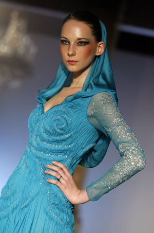 A model displays a creation by Syrian designer Rami Al Ali during his Rome Fashion Week Haute Couture Spring/Summer 2009 show Feb. 3, 2009.