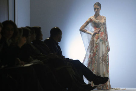 A model displays a creation by Syrian designer Rami Al Ali during his Rome Fashion Week Haute Couture Spring/Summer 2009 show Feb. 3, 2009.