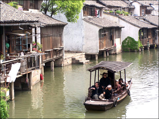 The town of Wuzhen in Tongxiang City, Zhejiang Province, has a history of more than 1,000 years. With ancient houses, workshops, and stores still standing on the river banks, it retains an almost unchanged atmosphere of antiquity. 