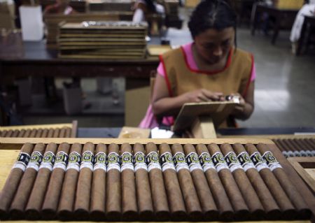 Obama cigars ready to be packed in boxes are placed on a table at the Segovia Cigars Factory in the Nicaragua