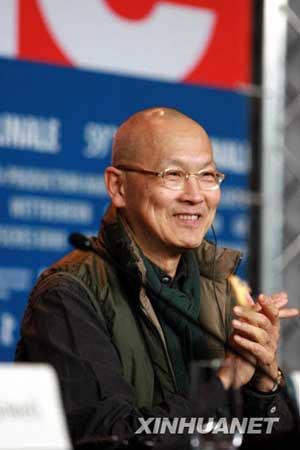 Hong Kong-born Chinese-American director Wayne Wang, jury member of the 59th Berlinale International Film Festival, smiles during a news conference in Berlin, capital of Germany, Feb. 5, 2009.