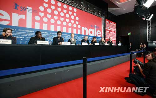 Jury members of the 59th Berlinale International Film Festival (L to R) U.S. star chef Alice Waters, Burkina Faso's movie director Gaston Kabore, German director Christoph Schlingensief, British actress Tilda Swinton, Swedish writer Henning Mankell, Spanish screenwriter and director Isabel Coixet and Hong Kong-born Chinese-American director Wayne Wang, attend a news conference in Berlin, capital of Germany, Feb. 5, 2009.