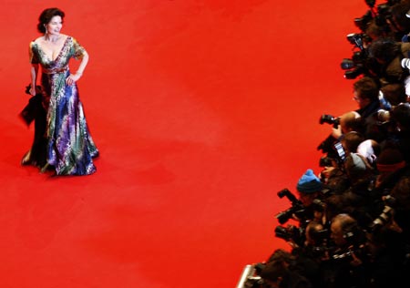 German actress Gudrun Landgrebe poses as she arrives at the red carpet for the screening of the opening film 'The International' at the 59th Berlinale film festival in Berlin February 5, 2009.