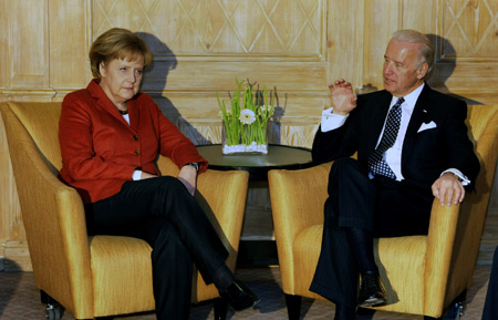 U.S. Vice President Joseph Biden (R) meets German Chancellor Angela Merkel during the 45th Conference on Security Policy in Munich February 7, 2009. [Xinhua/Reuters]