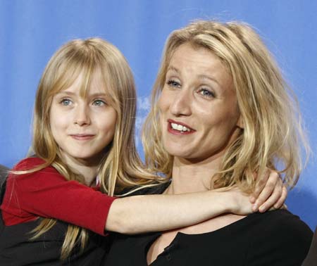 Actresses Alexandra Lamy (R) and Melusine Mayance pose during a photocall to promote the movie 'Ricky' of the 59th Berlinale film festival in Berlin, February 6, 2009.