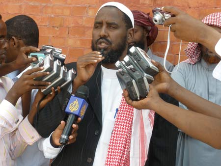 Omar Iman Abu Bakar, leader of the newly formed coalition of four insurgent groups, known as Hezbul Islam or the Islamic Party, speaks to the media in Mogadishu, the capital of Somalia, Feb. 7, 2009.