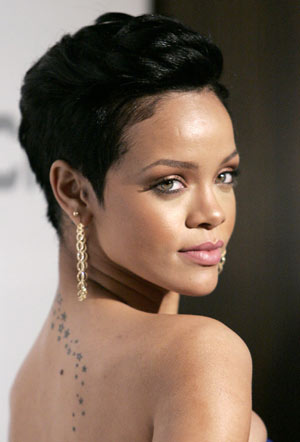 Rihanna arrives at the Recording Academy&apos;s Clive Davis pre-Grammy party in Beverly Hills, California Feb. 7, 2009.