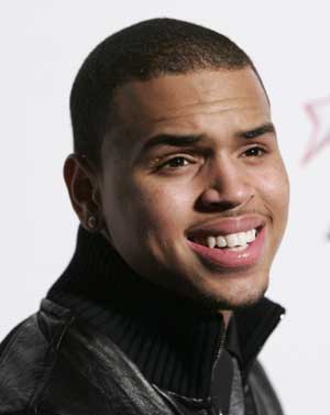 Recording artist Chris Brown arrives at the Recording Academy&apos;s Clive Davis pre-Grammy party in Beverly Hills, California Feb. 7, 2009. 