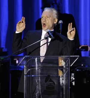 Television show host Bill Maher gestures as he speaks on stage at the 2009 Grammy Salute to Industry Icons event, honoring Clive Davis in Beverly Hills, California February 7, 2009. 