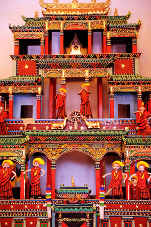 The handicraft made of ghee is displayed at the Taer Monastery in Huangzhong County, northwest China's Qinghai Province, Feb. 8, 2009.