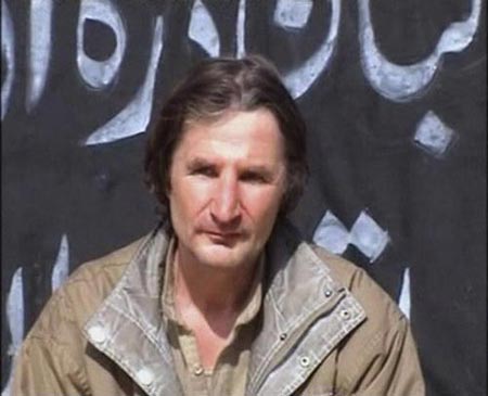 A frame grab from video footage released by Pakistani Taliban militants Feb.8, 2009 shows kidnapped Polish geologist Piotr Stanczak at an unknown location. Stanczak was kidnapped near Attock city, about 65 km (40 miles) west of Islamabad on September 28. 