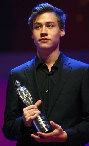 Actor David Kross holds his European 'Shooting Stars 2009' award during a ceremony at the 59th Berlinale film festival in Berlin, February 9, 2009. 