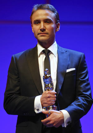 Actor Samuli Vauramo holds his European 'Shooting Stars 2009' award after being awarded during a ceremony at the 59th Berlinale film festival in Berlin, Feb. 9, 2009. 