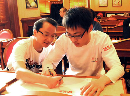 Gong Guilin (R), a boy who was crippled in the 5.12 massive earthquake in southweat China