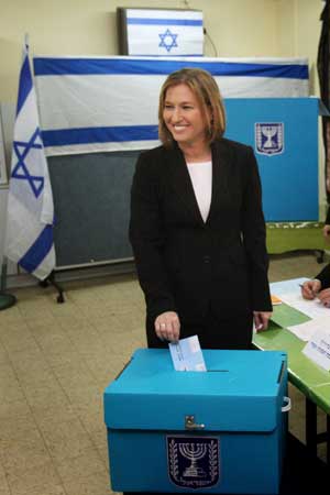 Israel's Foreign Minister Tzipi Livni casts her ballot for the parliamentary election at a polling station in Tel Aviv Feb. 10, 2009.