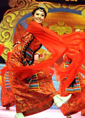 Actresses dance during a dress rehearsal of the evening party held by Lhasa TV station for the upcoming new year of Tibetan calendar which falls on Feb. 25, in Lhasa, capital of southwest China's Tibet Autonomous Region, Feb. 10, 2009. 