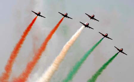 An Indian aerobatics team performs during the opening ceremony of an airshow in Bangalore, India, Feb. 11, 2009. 