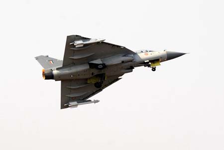 An Indian LCA battleplane performs at an airshow in Bangalore, India, Feb. 11, 2009. 