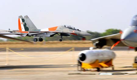 A Su-30MKI battleplane lands after performance at an airshow in Bangalore, India, Feb. 11, 2009. 