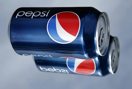 PepsiCo Inc's new marketing campaign, which includes new packaging graphics on cans shown here photographed in Encintas, California February 11, 2009. Pepsi Bottling Group Inc reported better-than-expected quarterly results on Tuesday, helped by productivity gains. The largest bottler of PepsiCo Inc drinks also forecast full-year earnings below analysts' estimates, but the outlook was not as bad as some investors had feared.
