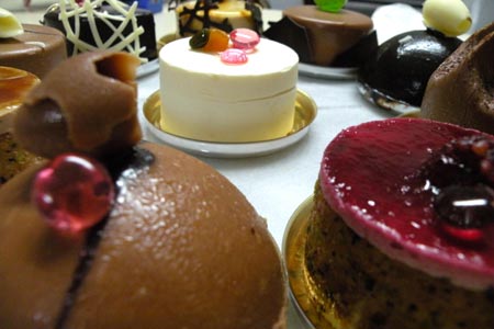 Cakes decorated with simulation diamonds, made by dessert master Florin Flan, are displayed in his workshop in Sibiu, central Romania, on Feb. 11, 2009.