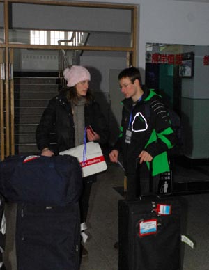 Members of Germany Universiade delegation talk at the Athletes Village of the 24th Winter Universiade in Harbin, capital city of northeast China's Heilongjiang Province, Feb. 12, 2009. 