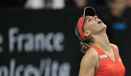 Elena Dementieva of Russia reacts during the final match against Amelie Mauresmo of France in the Paris Open tennis tournament in Paris, France, Feb. 15, 2009. Dementieva lost the match 1-2. 