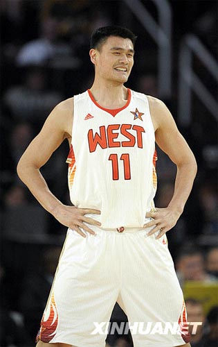 NBA's Chinese star Yao Ming smiles during the All-Star basketball game on February 16, 2009, in Phoenix, the USA. Yao, the starting center for the West, had two points and three rebounds. The West conference beat the East 146-119 to win the game. 