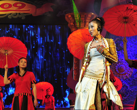 A singer presents a song during a rehearsal for the grand party scheduled to open on Feb. 24 to celebrate the upcoming Tibetan New Year, the year of Ox, in Lhasa, capital of sotuhwest China's Tibet Autonomous Region, Feb. 14, 2009. [Jia Lijun/Xinhua]