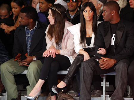 Singer Kanye West, actresses Milla Jovovich and Kim Kardashian and NFL football player Reggie Bush (L-R) attend the Y-3 Fall 2009 collection during New York Fashion Week February 15, 2009.[Xinhua/Reuters]