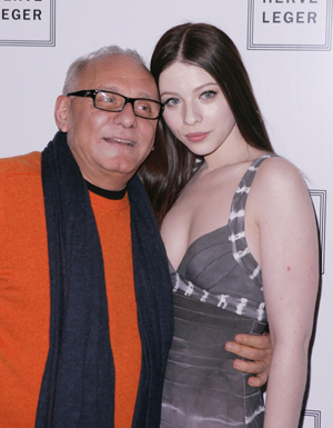 Designer Max Azria and actress Michelle Trachtenberg (R) arrive for the Herve Leger collection show at New York Fashion Week February 15, 2009. [Xinhua/Reuters]