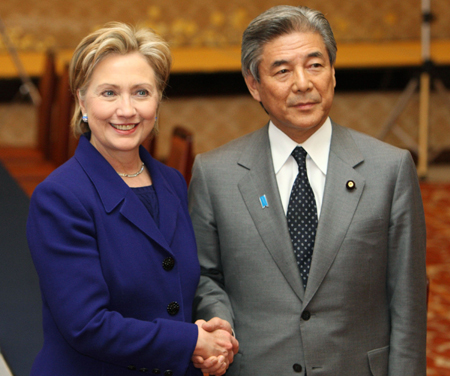 U.S. Secretary of State Hillary Clinton (L) shakes hands with Japanese Foreign Minister Hirofumi Nakasone during their talks in Tokyo Feb. 17, 2009.
