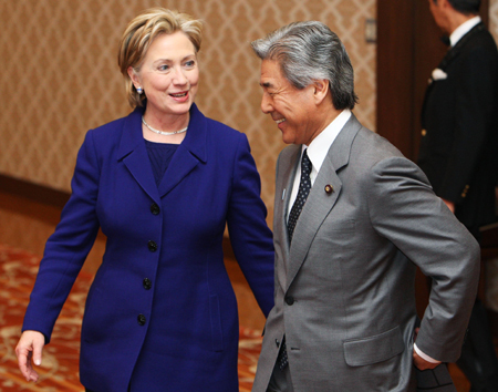 U.S. Secretary of State Hillary Clinton (L) walks with Japanese Foreign Minister Hirofumi Nakasone during their talks in Tokyo Feb. 17, 2009.