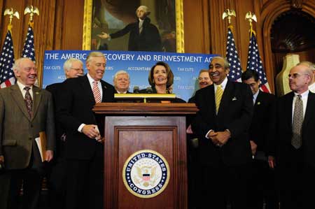 U.S. House Speaker Nancy Pelosi (C) speaks during the news conference right after the House passed the 789-billion-dollar stimulus package on the Capitol Hill in Washington on Feb, 13, 2009.[Xinhua