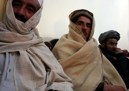 Taliban militants attend a surrendering ceremony in Kabul, capital of Afghanistan, Feb. 17, 2009. Over 60 Taliban militants from areas around Kabul laid down their arms and joined the peace process in Kabul on Tuesday. More than 2,000 Taliban militants have joined the peace process in the past two years.[Xinhua]