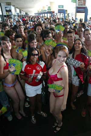 Brazilian models dance at a bus station during the third edition of 'Brazilian Underwear Day' in Brasilia Feb. 17, 2009. The day is inspired by a similar event which has taken place at Times Square in New York City since 2003. [Xinhua/Reuters]