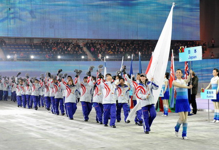 Athletes walk into Harbin International Conference, Exhibition and Sports Centre Gym at the opening ceremony of the 24th World Winter Universiade in Harbin, capital of northeast China's Heilongjiang Province, Feb.18, 2009. [Xinhua] 