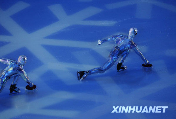 Artists perform prior to the opening ceremony of the 24th World Winter Universiade at Harbin International Conference, Exhibition and Sports Centre Gym in Harbin, capital of northeast China's Heilongjiang Province, Feb.18, 2009. [Xinhua]