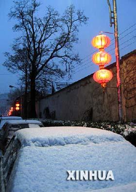 Snow and rain have swept northern parts of China, bringing some much-needed moisture.