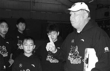 American Hall of Famer Dennis Ralston instructs Chinese teens in Eugene, Oregon, earlier this month during the 'Mercedes-Benz Swing for the Stars' tennis camp, a junior-level development program initiated by the Chinese Tennis Association (CTA) and its promoter, Beijing International Group (BIG).
