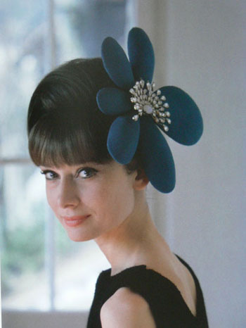 Photo taken by renowned photographer Howell Conant featuring Audrey Hepburn wearing some glamorous and fashionable hats. Audrey Hepburn was a legendary film actress. She is also one of the most quintessential fashion icons of all time. Her simple style and classic nature still influences our fashion choices today. 