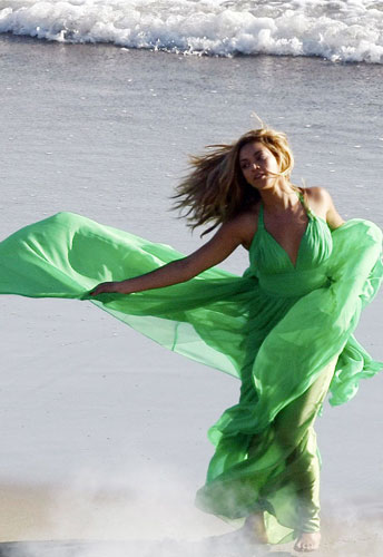 A series of American singer Beyonce Knowles' wild shots with a male co-star on a Malibu beach were released Thursday, Feb 18, 2009. The singer hit the sand to shoot her new video. Rumor has it that Beyonce Knowles will perform at the gala ceremony of the 81st Annual Academy Awards Sunday night. 