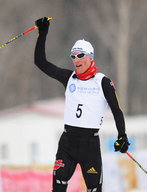 Gold medalist Steffen Tepel of Germany celebrates after the 10km cross country finals of Nordic combined individual competition at the 24th World Winter Universiade in the Yabuli Ski Resort, 195km southeast away from Harbin, capital of northeast China's Heilongjiang Province, Feb. 20, 2009. (Xinhua/Wang Jianwei)