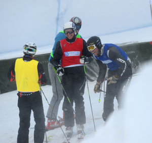 Gold medalist Antoine Galland of France (R), silver medalist Andreas Tischendorf of Germany (Front C) and bronze medalist Manuel Eicher of the Switzerland (L) communicate after the men's ski cross finals of freestyle skiing at the 24th World Winter Universiade in the Yabuli Ski Resort, 195km southeast away from Harbin, capital of northeast China's Heilongjiang Province, Feb. 20, 2009. (Xinhua/Xu Yu) 