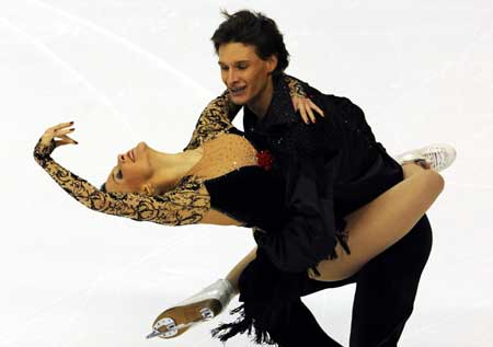 Ekaterina Rubleva (L) of Russia dances with her partner Ivan Shefer during the compulsory dance competition of ice dancing in figure skating in the 24th World Winter Universiade at Harbin International Conference, Exhibition and Sports Center Gym in Harbin, capital of northeast China&apos;s Heilongjiang Province, Feb. 21, 2009. Ekaterina Rubleva and Ivan Shefer took the second place with 34.43 points after the compulsory dance. 