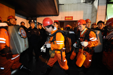 Rescue workers prepare to get into the coal mine to look for survivors in north China's Shanxi Province, Feb. 22, 2009. More than 70 miners have died after a coal mine blast occurred at about 2: 00 a.m. Sunday at the Tunlan Coal Mine of Shanxi Coking Coal Group in Gujiao City near Taiyuan, capital of north China's Shanxi Province, while rescuers are pulling out the trapped from the shaft, according to a rescuer at the site. [Xinhua] 